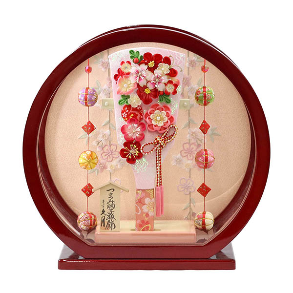 つまみ細工 羽子板 桃赤花 白檀塗り 鞠三連つるし付き 円形 丸型アクリルケース